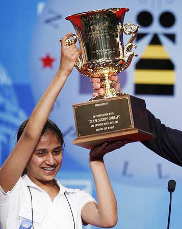 Speller Kavya Shivashankar from Olathe, Kansas, lifts the trophy after winning the 2009 National Spelling Bee in Washington on May 28
