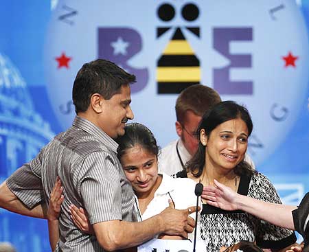 Speller Kavya is congratulated by her father Mirle Shivashankar and mother Sandhya