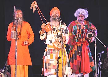 Baul singers Kanai, left, and Debdas, centre, perform at the launch of Nine Lives in Delhi