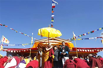 The Dalai Lama arrives to deliver Buddhist teachings at Tawang