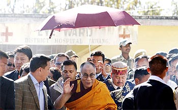 The Dalai Lama arrives at a hospital at Tawang