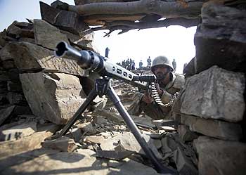 A Pakistani soldier poses for the media.