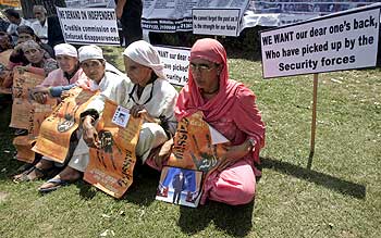 Kashmiri relatives of missing persons hold placards during a peaceful demonstration organised by the Association of Parents of Disappeared Persons in Srinagar.