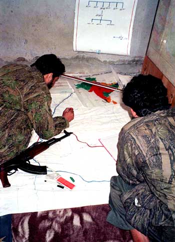 Lashkar terrorists study a map of a target in Jammu and Kashmir.