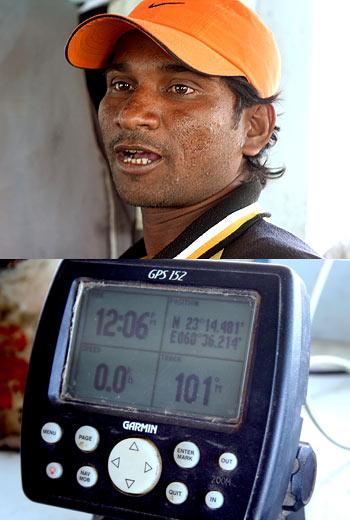 Narsi Thakker and the GPS installed on his boat Tej Vishwa at Jakhau.