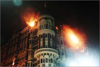 A portion of the Taj Mahal hotel on fire during the 26/11 attack