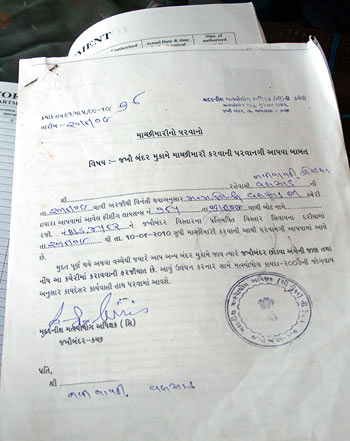 A copy of the fishing permit issued to a tandel, whose boat is registered in Valsad, by Fisheries, Jakhau; some details deleted on request