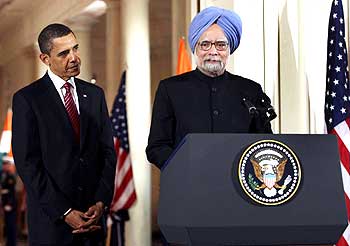 Prime Minister Dr Singh speaks as Obama listens in rapt attention