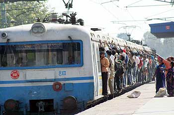 Passengers jostled for space in commuter trains as buses kept off roads