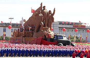 -A float is seen during a parade to mark the 60th anniversary of the founding of the People's Republic of China