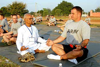 US soldiers take breathing advice from Ram Dhani Bajpai, yoga instructor