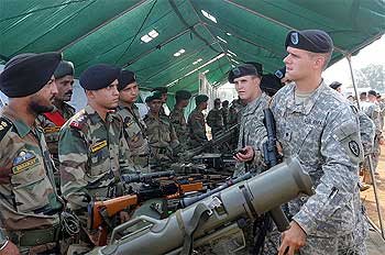 US Army personnel share info on weapons systems at the static display