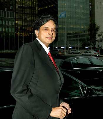 Tharoor outside the United Nations building in New York