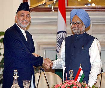 Afghanistan's incumbent President Hamid Karzai (left) with Indian Prime Minister Manmohan Singh