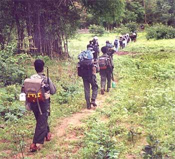 Naxals on their way deep inside a forest