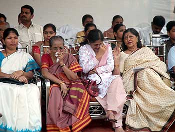 Slain ATS chief Hemant Karkare's wife (in pink) breaks down during the ceremony