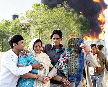 Families mourn the death of relatives who died in the massive fire at Indian Oil Corporation's fuel depot in Sitapura industrial area on the outskirts of Jaipur