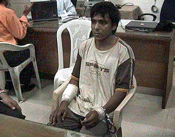 The lone surviving terrorist, Ajmal Kasab, in custody