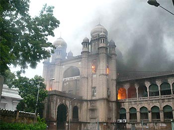 The court complex engulfed by flames