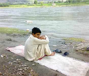 Akhtar Gul on the banks of the Swat River