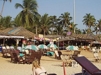 Tourists relax at a Goa beach