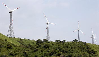 Power-generating windmill turbines at the Suzlon wind farm at Sanodar village