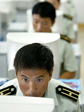 Chinese troops learn to use computers at a military base in Tianjin
