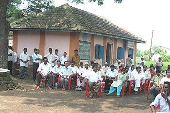 Villagers attend the People's Audit in Div, Raigad