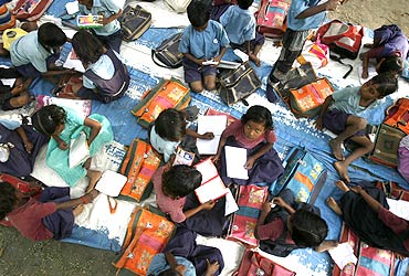 Children at an open air school on the outskirts of New Delhi