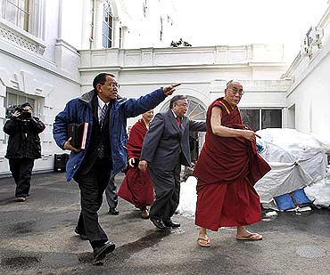 The Dalai Lama leaves the White House after his meeting with US President Barack Obama