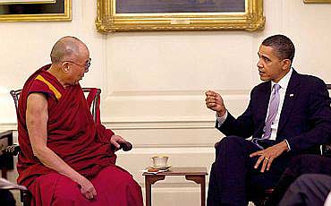 US President Barack Obama interacts with the Dalai Lama at the White House