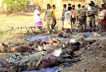 Bodies of policemen who were killed in a Maoist attack, seen lying on the ground