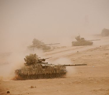 Pakistani army tanks take part in the military exercise