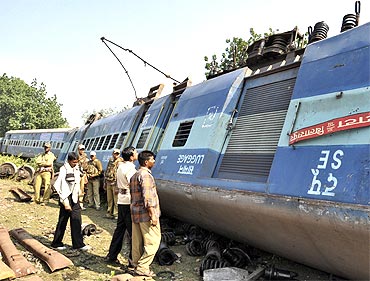 A train compartment which was derailed after Maoist rebels blew up a railway track in Jharkhand