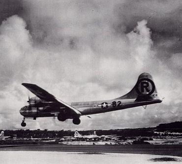 The Enola Gay lands at the island of Tinian after the bombing