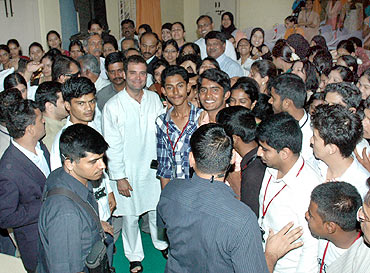 Rahul poses for a picture with the students