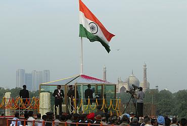 India's PM Singh addresses the nation during Independence Day celebrations in Delhi