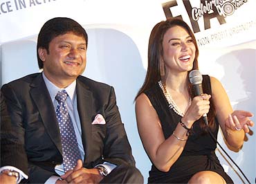 Preity Zinta at the Federation of Indian Associations press conference in New York, with FIA chief Nirav Mehta