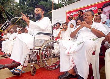 File photo shows Madani sharing the dais with Communist leader Pinarayi Vijayan