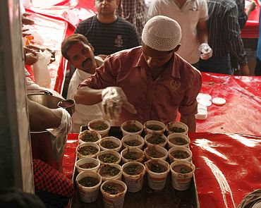 A shop employee readies the Haleem for sale