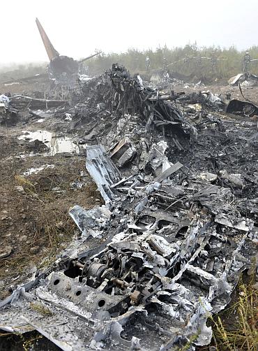 The wreckage of a crashed passenger plane is seen in Yichun, northeast China's Heilongjiang Province August 25, 2010