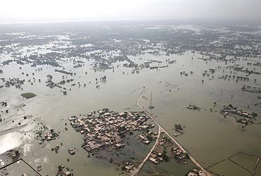 An aerial view shows a flooded village in Rajanpur district of Pakistan's Punjab province
