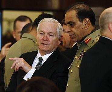 US Secretary of Defence Gates talks to Pakistan's Chief of Army Staff Kayani at the State Department in Washington, DC