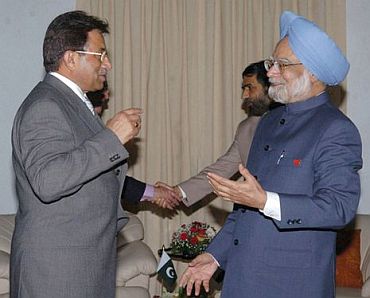 A file photo of General Pervez Musharraf with Prime Minister Manmohan Singh
