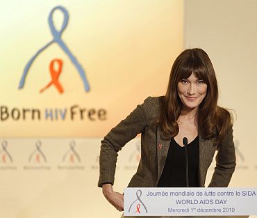 Carla speaking during a news conference for World AIDS Day at the Marigny hotel in Paris on December 1, 2010
