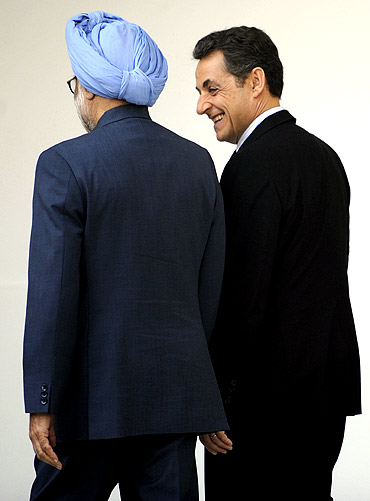 Sarkozy has a chat with Dr Singh at Hyderabad House in New Delhi on Monday