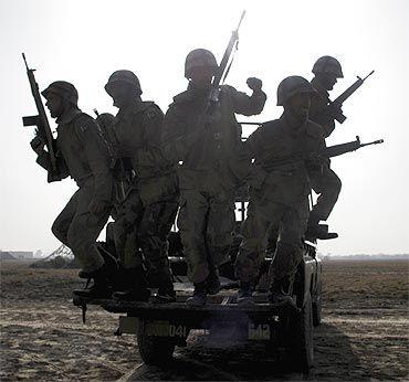 Pakistan soldiers in action in the North West Frontier Province