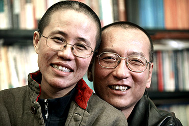 Chinese dissident Liu Xiaobo and his wife Liu Xia pose in this undated photo released by his family