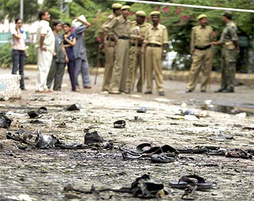 Security personnel at the site of a bomb blast in Ahmedabad on July 27, 2008
