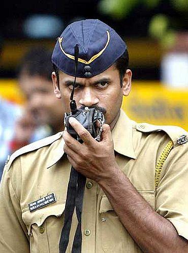 A police constable on walkie-talkie